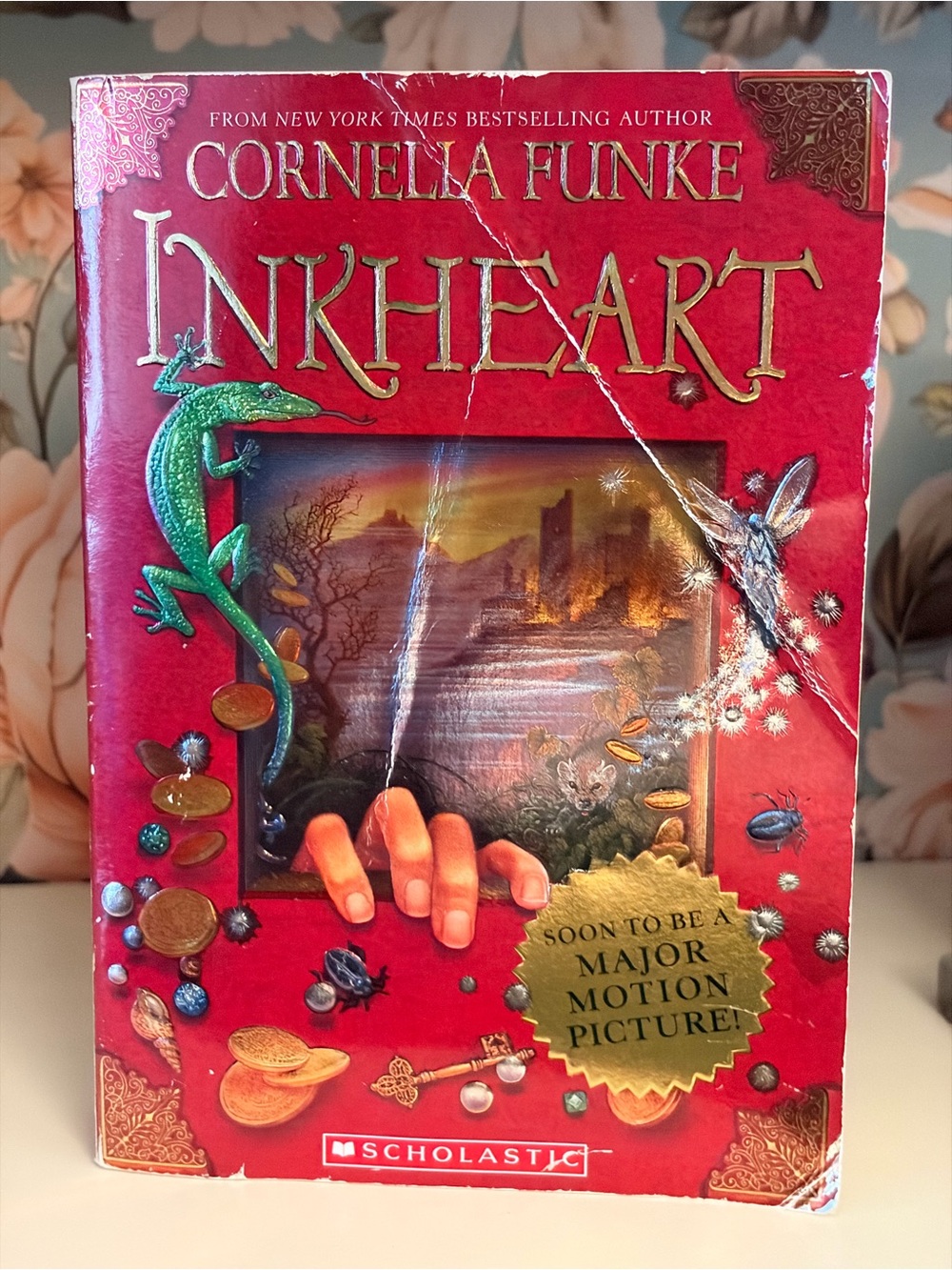 Scholastic Inkheart Book Cover in Bright Red with Green Accents